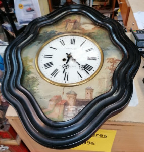 Horloge Oeil de boeuf signée Besnard à Chateaulin
