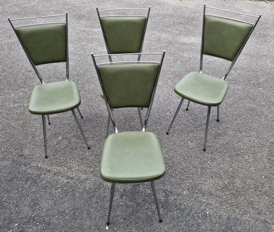 Ensemble de 4 chaises vintages en skaï vert de la marque TUBLAC
