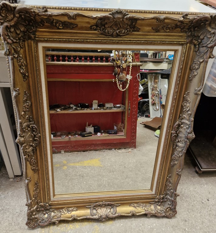 Grand miroir contour doré