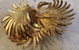 Broche "PHÉNIX" en métal jaune