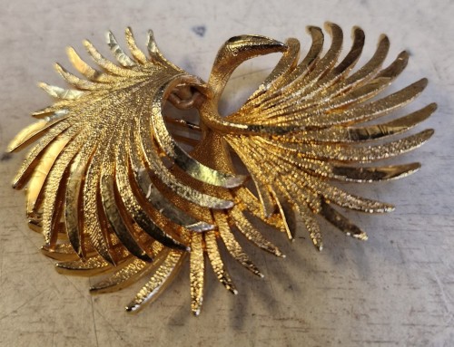 Broche « PHÉNIX » en métal jaune