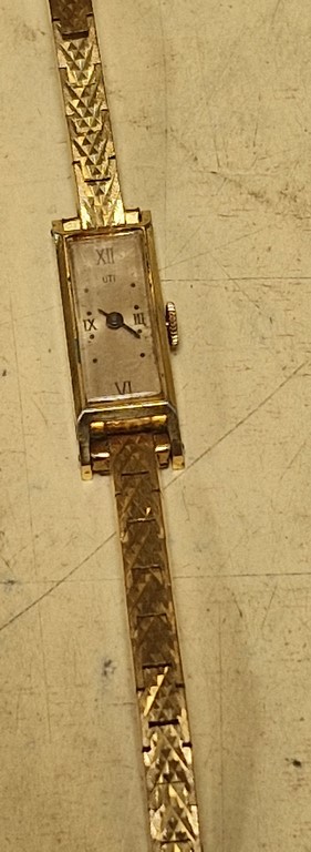Montre plaquée or à réviser